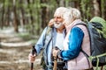 Senior couple hiking in the forest