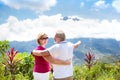 Senior couple hiking in mountains and jungle Royalty Free Stock Photo