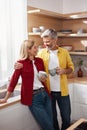 Senior Couple Holding Coffee. Happy Mature Spouses Drinking Morning Coffee Royalty Free Stock Photo