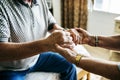 Senior couple holding hands together Royalty Free Stock Photo