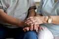 Senior couple holding hands together Royalty Free Stock Photo