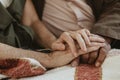 Senior couple holding hands together Royalty Free Stock Photo