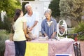 Senior Couple Holding Yard Sale Royalty Free Stock Photo