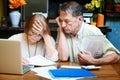 Senior couple at home with many bills Royalty Free Stock Photo