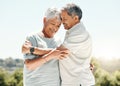 Senior couple, hug and happy in nature on vacation, holiday or summer bonding. Love, hugging and retirement of man and Royalty Free Stock Photo