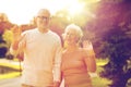 Senior couple hugging in city park Royalty Free Stock Photo