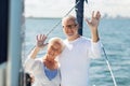 Senior couple hugging on sail boat or yacht in sea Royalty Free Stock Photo