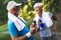 Senior couple jogging and running outdoors in nature Royalty Free Stock Photo