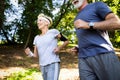 Senior couple jogging and running outdoors in nature Royalty Free Stock Photo