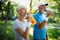 Senior couple jogging and running outdoors in nature Royalty Free Stock Photo