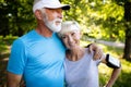 Senior couple jogging and running outdoors in nature Royalty Free Stock Photo