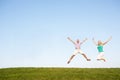 Senior couple jumping in air Royalty Free Stock Photo