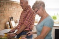 Senior couple at the kitchen Royalty Free Stock Photo