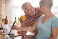 Senior couple at the kitchen Royalty Free Stock Photo