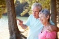 Senior couple at lake together Royalty Free Stock Photo