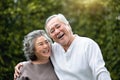 Senior Couple laughing at the park Royalty Free Stock Photo