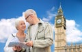 Senior couple with map over london big ben tower Royalty Free Stock Photo