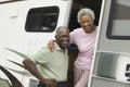 Senior couple with motor home (portrait)