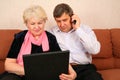 Senior couple with notebook Royalty Free Stock Photo