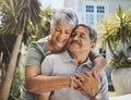 Senior, couple and old man and woman hug with love, care and support outside their home or house. Lovers, pensioner and Royalty Free Stock Photo