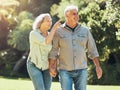 Senior couple, outdoor and conversation in nature park and active on hiking adventure or walk for love, relax and fresh