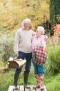 Senior Couple Outdoors With Picnic Basket Royalty Free Stock Photo