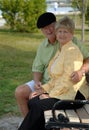 Senior Couple On Park Bench
