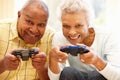 Senior couple playing computer games Royalty Free Stock Photo