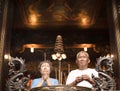 Senior couple praying buddha with incense stick Royalty Free Stock Photo