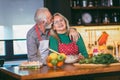 Senior couple preparing food in the kitchen Royalty Free Stock Photo