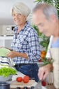 senior couple preparing meal at home Royalty Free Stock Photo