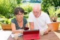 Senior couple preparing vacation trip Royalty Free Stock Photo