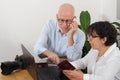 Senior couple preparing vacation trip with passport Royalty Free Stock Photo