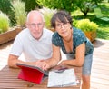 Senior couple preparing vacation trip Royalty Free Stock Photo