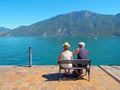 Senior Couple relaxing and admiring Garda Lake Royalty Free Stock Photo