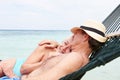 Senior Couple Relaxing In Beach Hammock Royalty Free Stock Photo