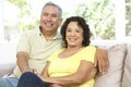 Senior Couple Relaxing At Home Together