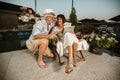 Senior couple relaxing outdoor and using tablet Royalty Free Stock Photo
