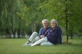 Senior couple resting outdoors Royalty Free Stock Photo