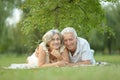 Senior couple resting outdoors Royalty Free Stock Photo