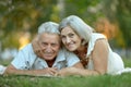 Senior couple resting outdoors Royalty Free Stock Photo