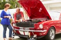 Senior Couple With Restored Classic Car Royalty Free Stock Photo