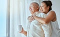 Senior couple, retirement future and window vision for thinking, love and care in Colombia home. Happy, elderly and Royalty Free Stock Photo