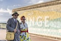 Senior couple in retro attire at the seafront in Morecambe.