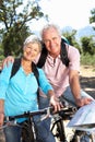 Senior couple riding bikes