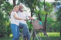 Senior Couple Riding Bikes In Park Royalty Free Stock Photo