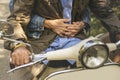 Senior couple riding a classic scooter Royalty Free Stock Photo