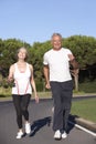 Senior Couple Running On Road Royalty Free Stock Photo