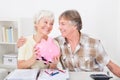 Senior couple saving money Royalty Free Stock Photo