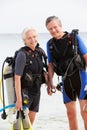 Senior Couple With Scuba Diving Equipment Enjoying Holiday Royalty Free Stock Photo